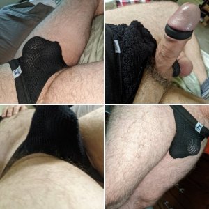 Hairy hard throbbing cock and balls bulging in black JC Athletic swimmer & cock rings.