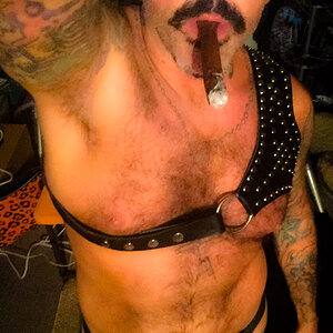 STINKYDONGER IN BLACK LEATHER LACE-UP JOCK & STUDDED HARNESS
