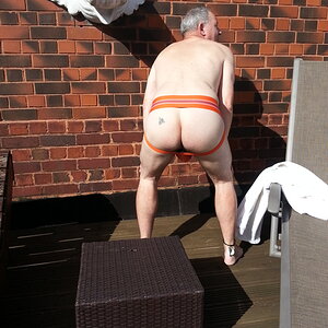 Rear view of the orange Jock Mail #2 on the roof terrace