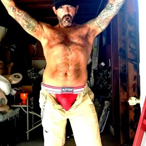 STINKYDONGER IN RED C-IN2 JOCKSTRAP & PUMAS