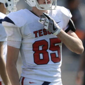 cupped football player