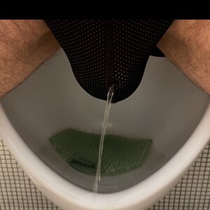 Sitting On A Urinal Pissing Through Jock