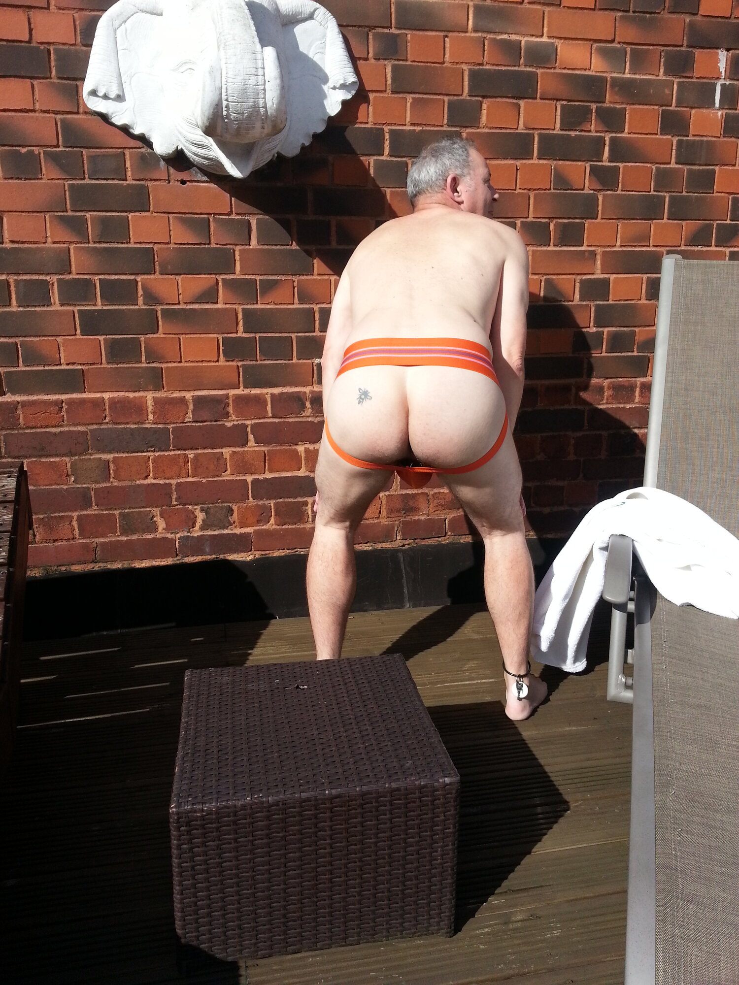 Rear view of the orange Jock Mail #2 on the roof terrace